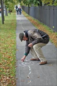 Michael Stuttard takes a chalk along the South Common (Robie Street near Camphill Cemetery).